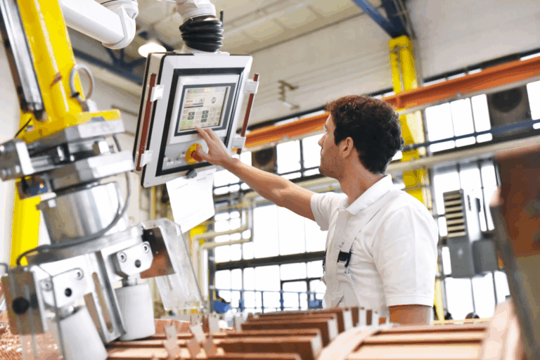 A Person Using A CNC Machine - Satie NA